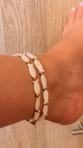 White fish anklet